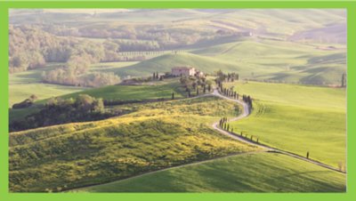 Rolling green and yellow hills with an isolated villa under soft morning sunlight